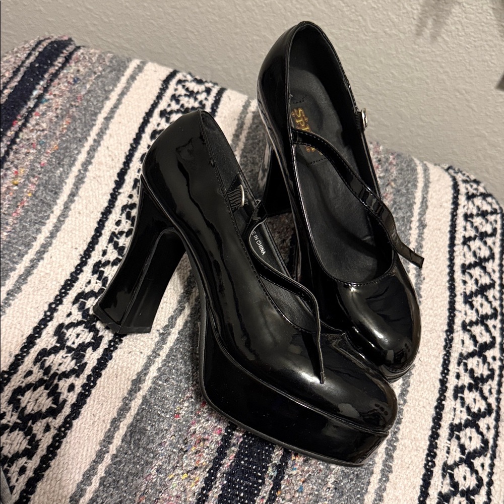 From the Spirit Halloween store: Black platform Mary Jane’s size 8. Worn once.